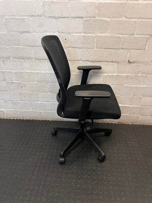 Black Mesh Back Swivel Office Chair with Armrests — Fair Condition with Visible Wear – back view