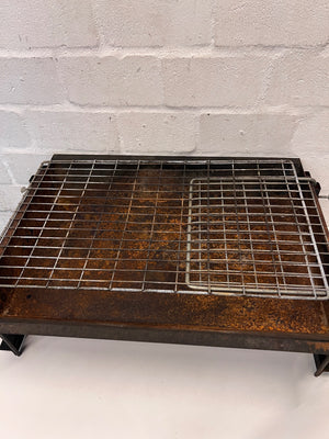 Compact Metal Wood-Burning Braai Stand with Grid — Significant Surface Rust and Heavy Wear – back view