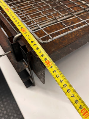 Compact Metal Wood-Burning Braai Stand with Grid — Significant Surface Rust and Heavy Wear – depth measurement