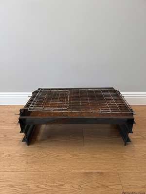 Compact Metal Wood-Burning Braai Stand with Grid — Significant Surface Rust and Heavy Wear – styled product image
