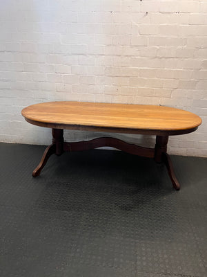 Oval Two-Tone Wooden Dining Table with Trestle Base — Good Working Order with Additional Items Included – main front view