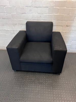 Black Synthetic Polyester 1 Seater Couch — Stains on Material; Intact Structure – top view