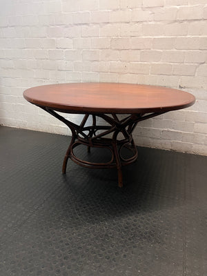 Round Wooden Dining Table with Rattan Style Base — Fair Condition with Visible Wear – condition detail
