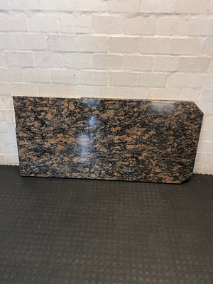 Polished Brown Mottled Stone Countertop with Sink Cutout – side view