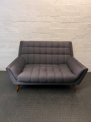 Grey Tufted Fabric 2 Seater Couch with Wooden Legs — Good with Minor Wear and Tear – main front view