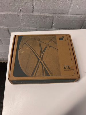 ZTE White WiFi 6 Router with Power Adapter — Good Working Order – top view