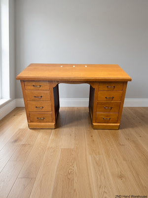 Classic Oak Pedestal Office Desk with Eight Drawers — Fair Used Condition – styled product image