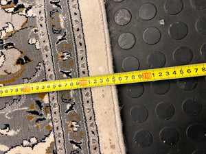 Square Patterned Area Rug with Fringe Border – height measurement