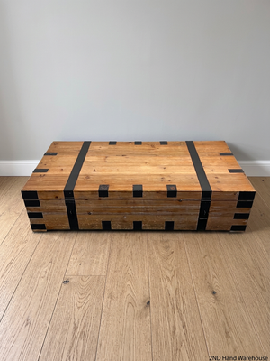 Large Rustic Wooden Chest Coffee Table with Metal Banding – styled product image