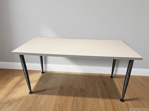 White Rectangular Office Desk with Tapered Metal Legs – styled product image
