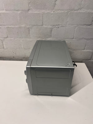 LG Silver Countertop Microwave with Manual Dials — Working but Plate Does Not Rotate – condition detail