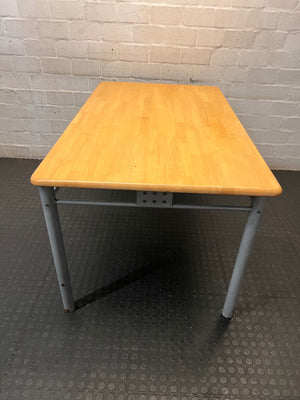 Rectangular Wood-Look Table with Grey Steel Legs – back view
