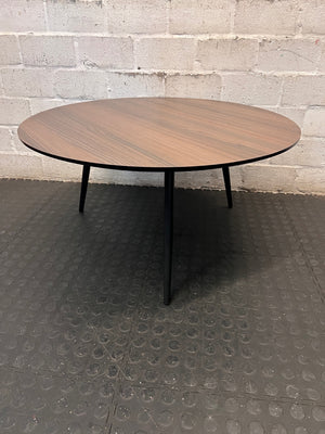 Round Wood-Grain Finish Coffee Table with Tapered Legs – condition detail