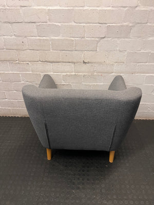 Dark Grey Fabric Armchair with Embossed Back and Wooden Legs – condition detail