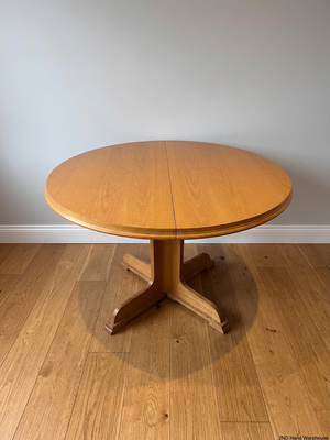 Round Wood-Finish Pedestal Dining Table – styled product image