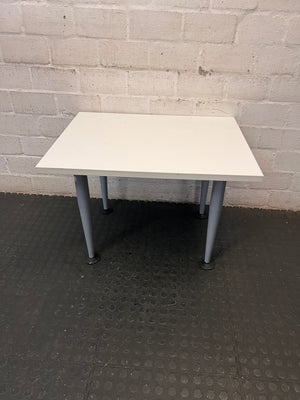 White Rectangular Coffee Table with Tapered Grey Legs – main front view