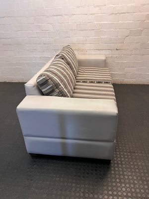 White Two Seater Couch with Striped Fabric Cushions – back view
