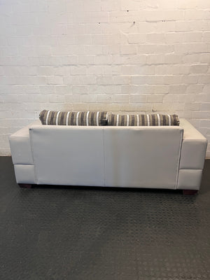 White Two Seater Couch with Striped Fabric Cushions – condition detail