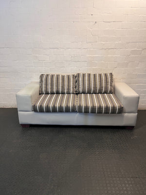 White Two Seater Couch with Striped Fabric Cushions – main front view