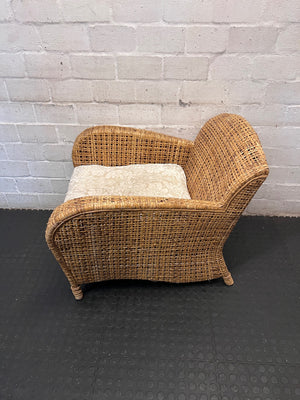 Wicker Armchair with Patterned Cushion – side view