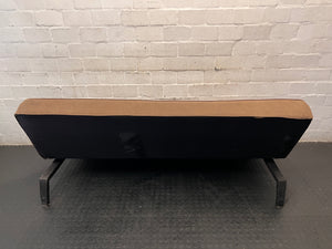 Brown Fabric Armless Sleeper Couch – back view