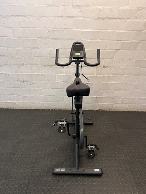 Trojan Spin 120 Exercise Bike in Dark Grey — Good Working Order; Missing Sticker on Wheel