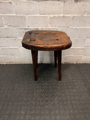 Rustic Hand-Carved Three-Legged Wooden Stool