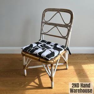 Distressed White Rattan Chair with Modern Graphic Cushion - 2ndhandwarehouse.com