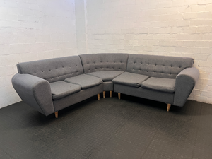 Grey Fabric Tufted L-Shape Couch — Worn Seating Cushions and Skew Feet - 2ndhandwarehouse.com