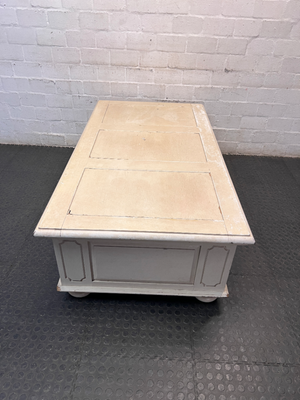 Cream Panelled Wood Coffee Table with Bun Feet — Visible Wear and Paint Chipping