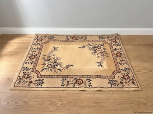Floral Bordered Area Rug with Greek Key Detail — Well Used with Visible Fading