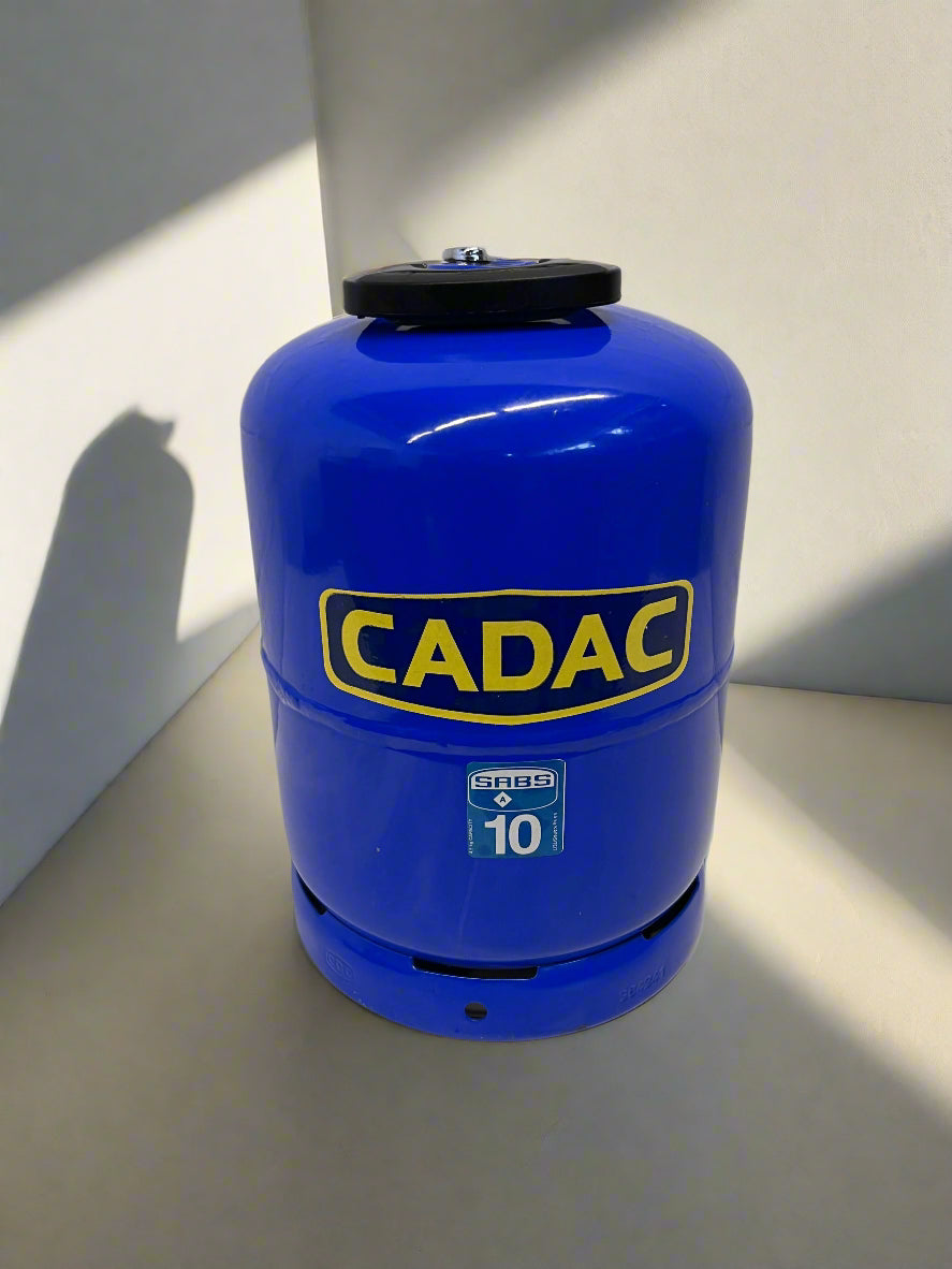 Blue gas cylinder with 'CADAC' branding on a light background