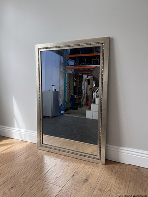 Rectangular Silver-Toned Mirror with Ornate Frame Detail