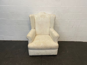 Cream Material Wingback Chair