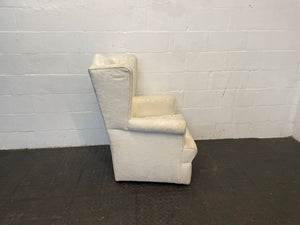 Cream Material Wingback Chair