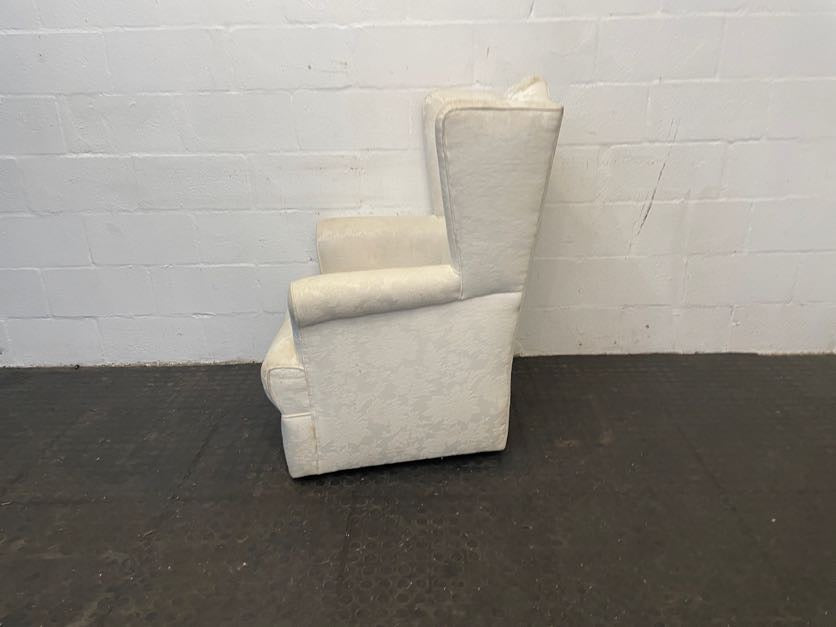 Cream Material Wingback Chair