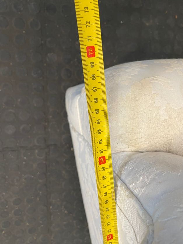 Cream Material Wingback Chair