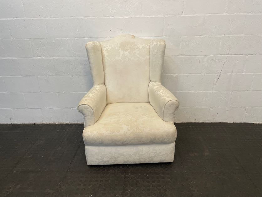 Cream Material Wingback Chair