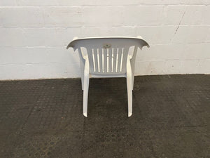 White Ribbed Broken Plastic Chair