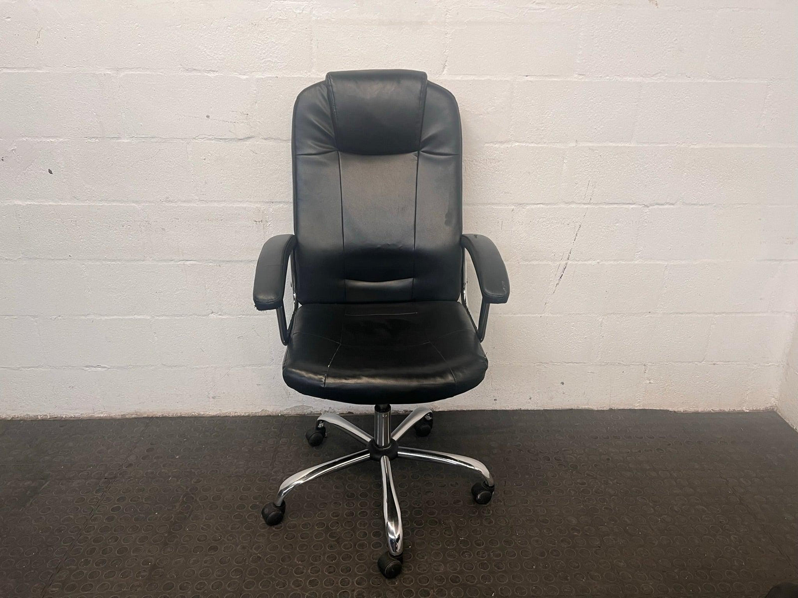 Black Padded Office Armchair on Wheels