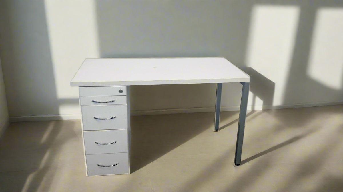 A white office desk with four drawers and steel legs against a white background.