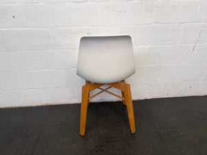 White Plastic Dining Chair with Wooden Legs (Slight Cracks In Seat) - PRICE DROP