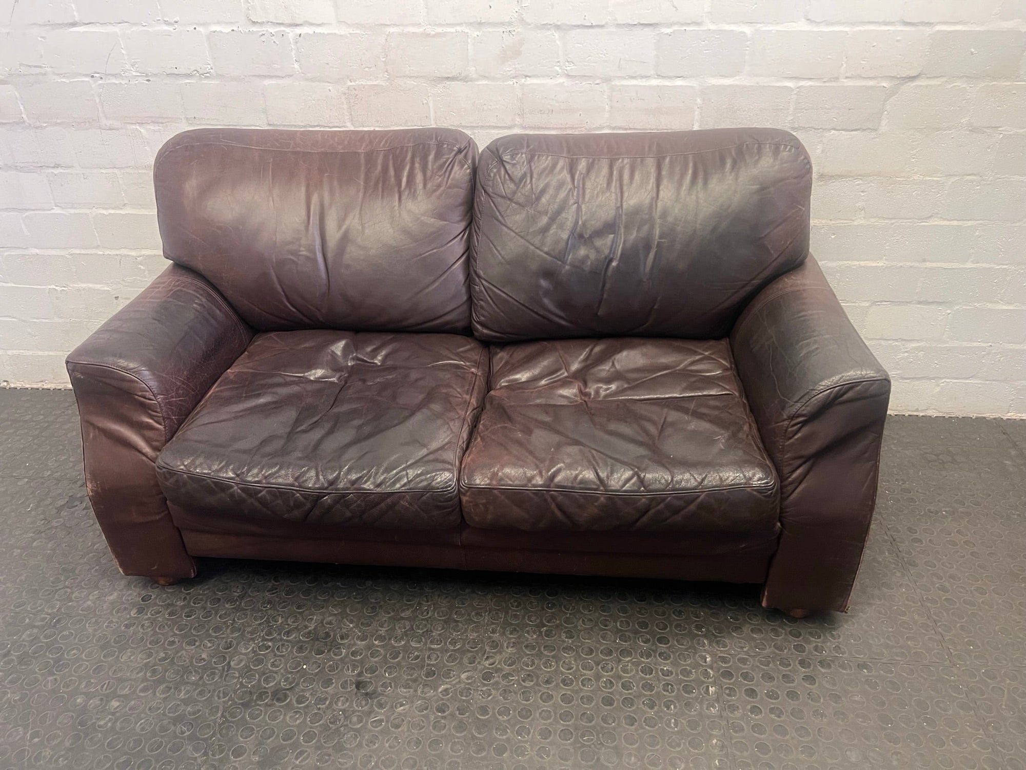 Dark Brown Leather Two Seater Couch (Damaged Underneath)