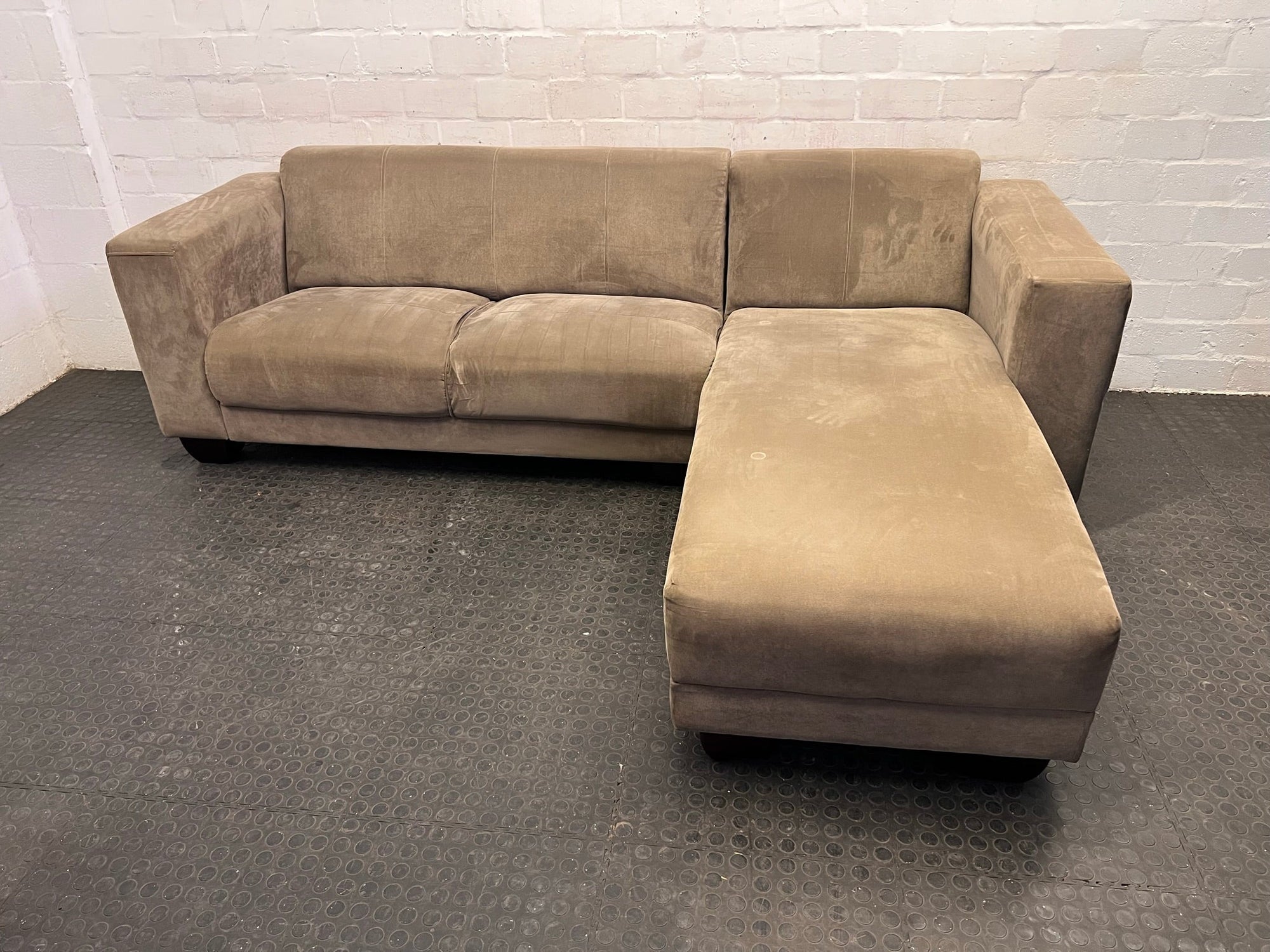 Beige Material Three Seater L-Shaped Couch