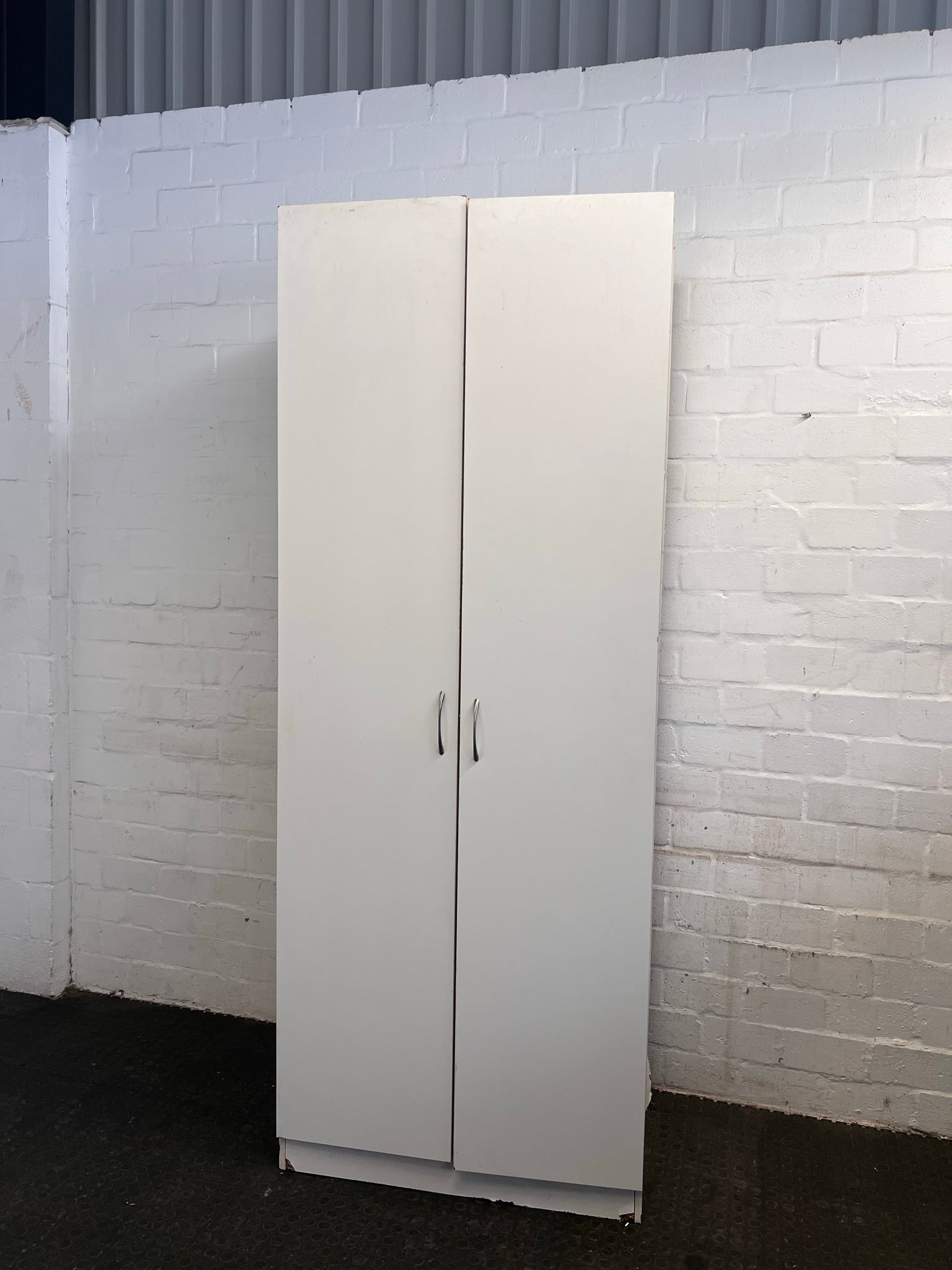 White Two Door Moveable Cupboard (Some Chipping)