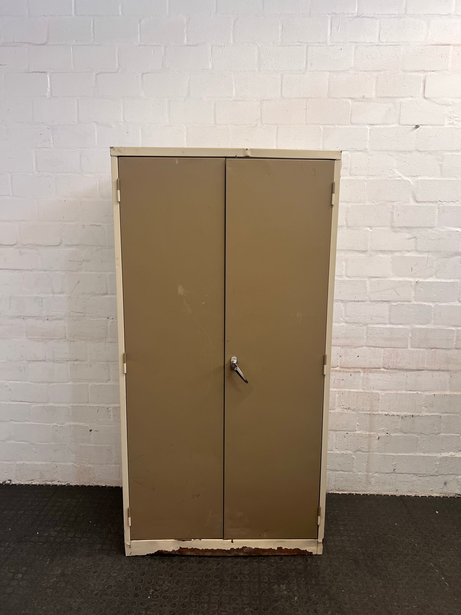 Beige Two Door Steel Filing Cabinet (Dented and Scratched/Rusted Bottom)