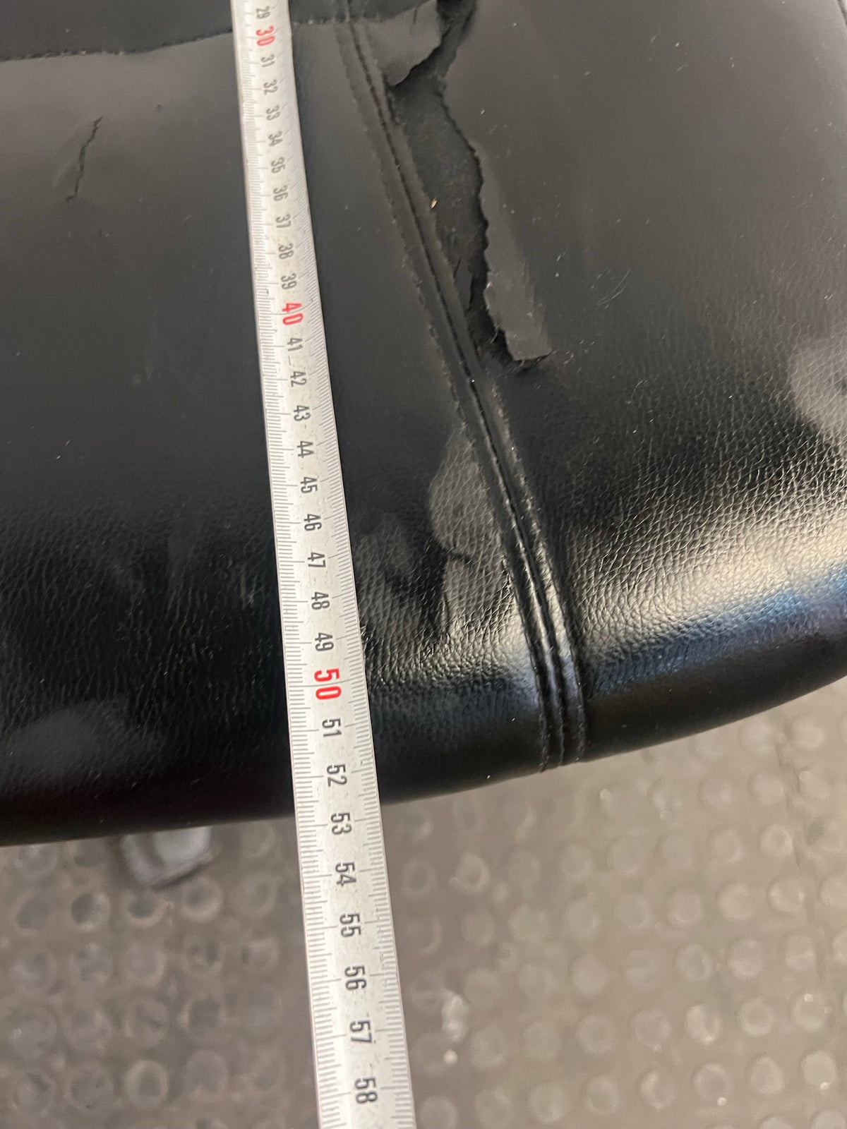 Black Office Footstool on Wheels (Torn Seat)