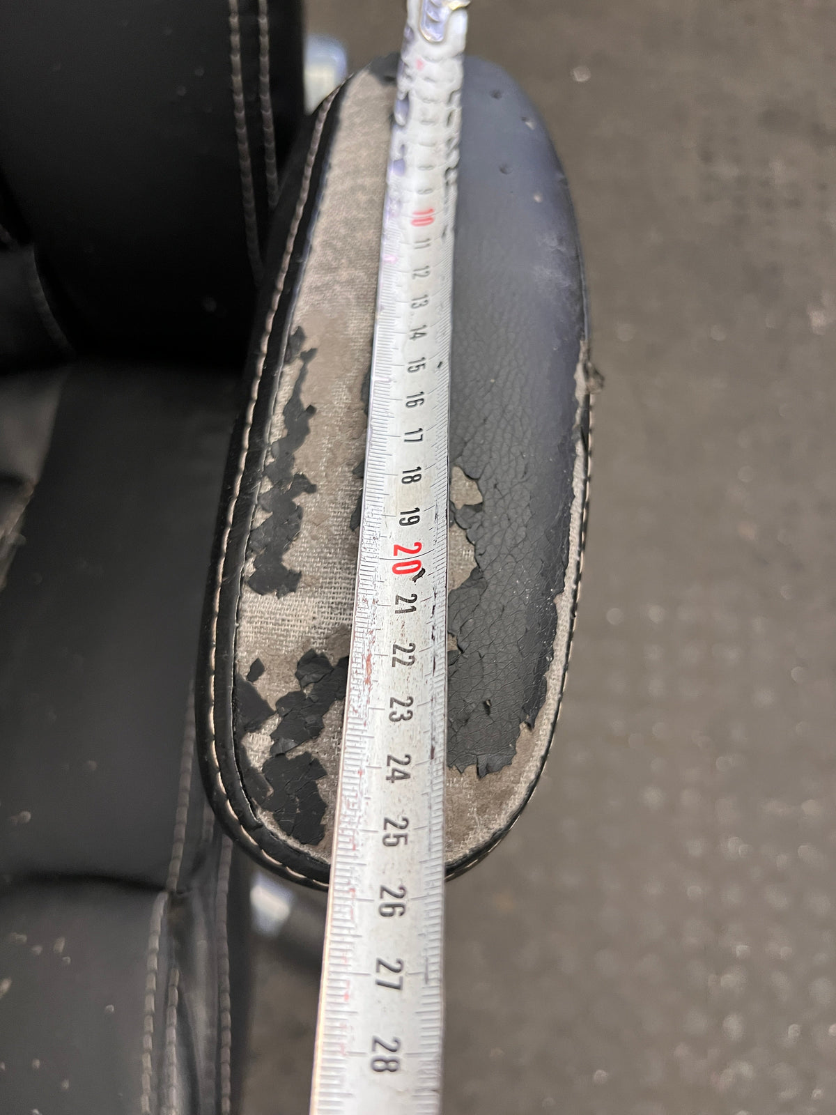 Black Padded Office Armchair on Wheels (Peeling Pleather)