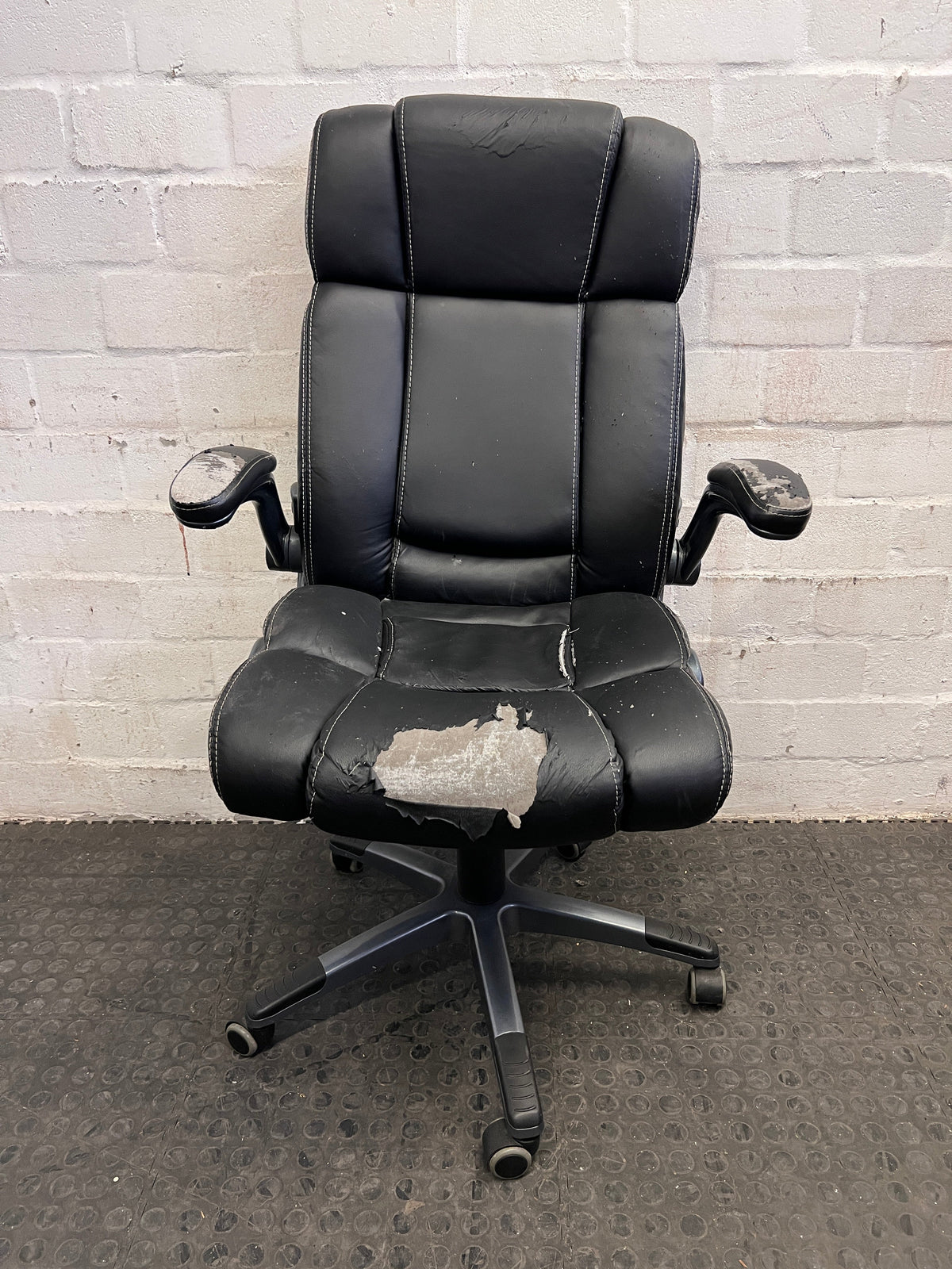 Black Padded Office Armchair on Wheels (Peeling Pleather)