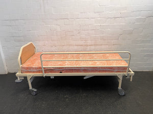 Hospital 3/4 Bed with Orange Floral Mattress On Wheels (LHS Cot Side)